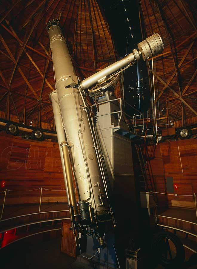 The 24 inch Alvan Clark refractor telescope, used in the discovery of Pluto. Lowell Observatory, Flagstaff, Arizona, photo by Steve Bruno