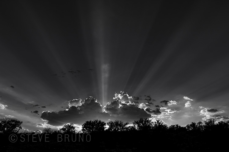 Suns rays, desert, clouds